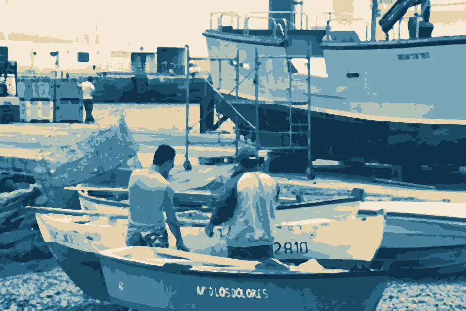 Playa Blanca bay: Local men by boat, Playa Blanca, Lanzarote, Canary Islands (2667771464)